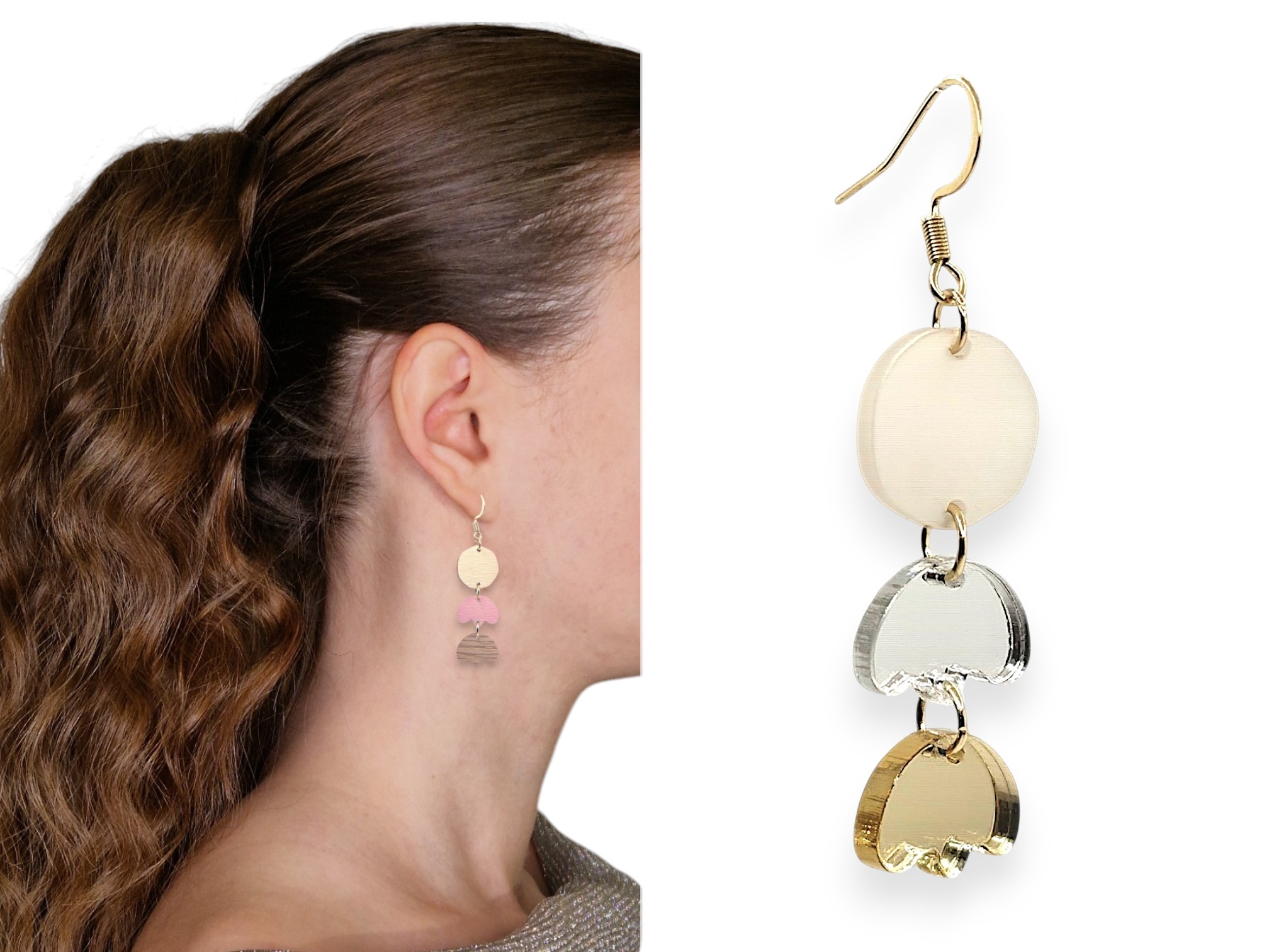 Doris | Puiset korvakorut | Korvakorut | Koruliike Auros Kotimainen verkkokauppa Profile of a woman wearing a long dangling earring made of connected gold tone circular discs on her ear side white background | Puiset korvakorut | Korvakorut | Koruliike Auros Kotimainen verkkokauppa